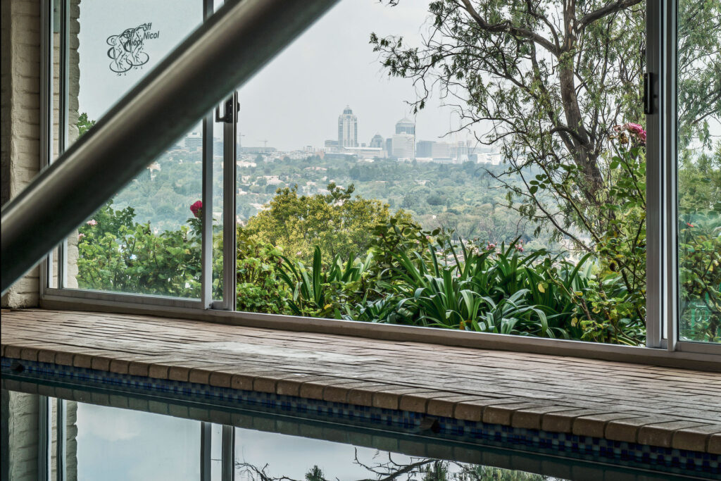 Fish and Field Biokineticists Off Nicol practice view of aquatic therapy pool area with view of Sandton skyline